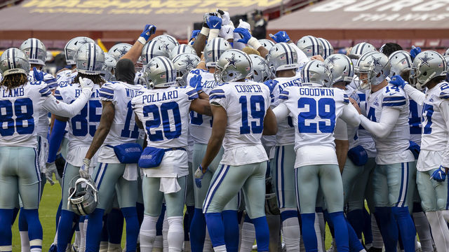 LANDOVER, MD - OCTOBER 25: Dallas Cowboys players huddle before the game against the Washington Football Team at FedExField on October 25, 2020 in Landover, Maryland.