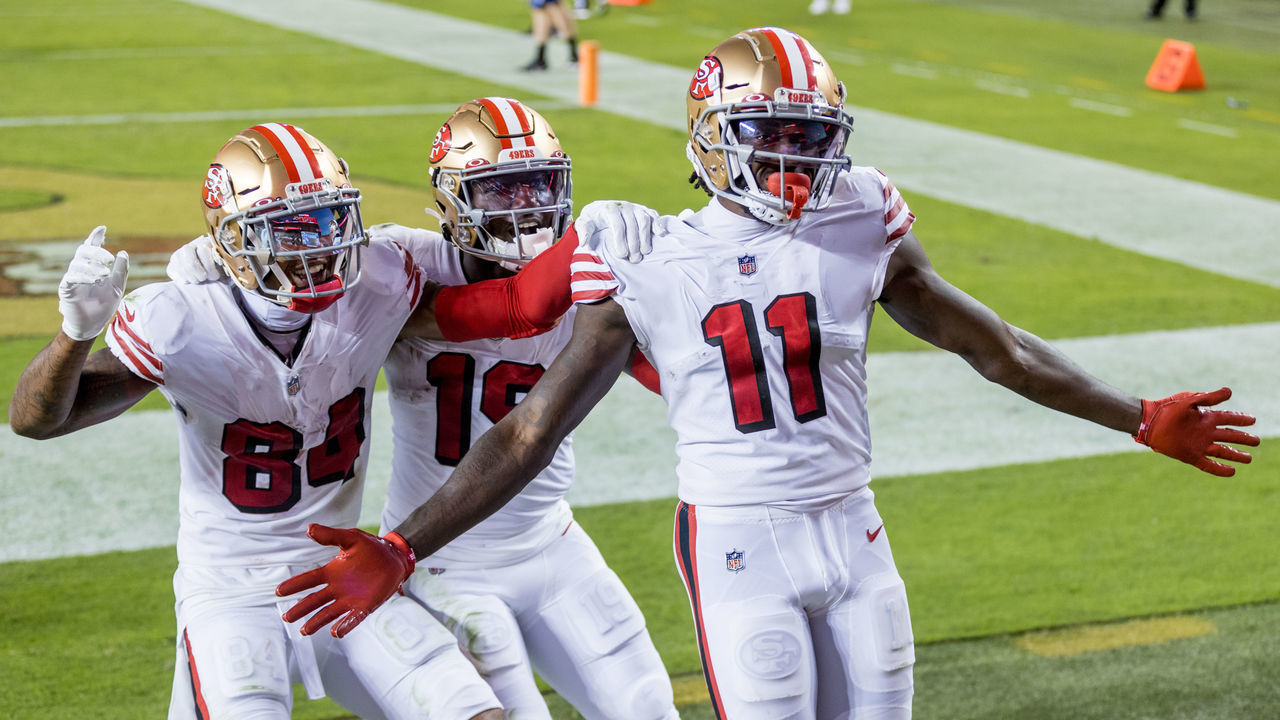 SANTA CLARA, CA - OCTOBER 18: San Francisco 49ers Wide Receiver Brandon Aiyuk (11) celebrates his touchdown pass during the NFL football game between the Los Angeles Rams and San Francisco 49ers on October 18, 2020 in Santa Clara, CA.
