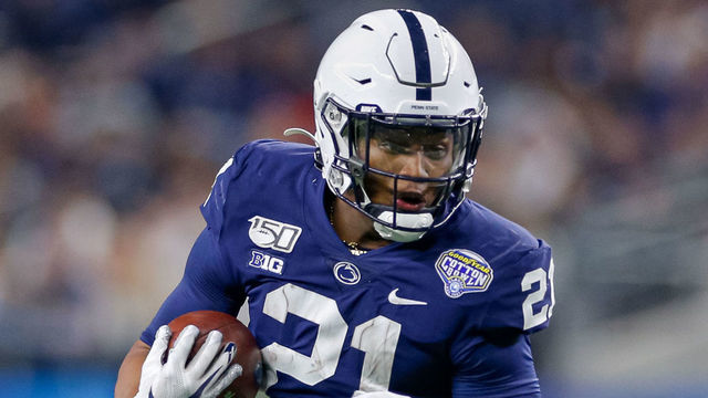 ARLINGTON, TX - DECEMBER 28: Penn State Nittany Lions running back Noah Cain (21) rushes during the Cotton Bowl Classic between the Memphis Tigers and Penn State Nittany Lions on December 28, 2019 at AT&T Stadium in Arlington, TX.