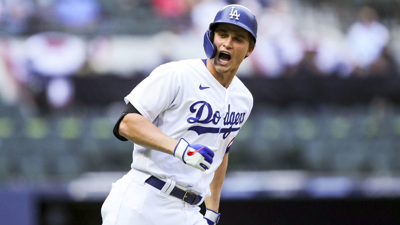 ARLINGTON, TX - OCTOBER 17: Corey Seager #5 of the Los Angeles Dodgers celebrates after hitting a solo home run in the first inning during Game 6 of the NLCS between the Atlanta Braves and the Los Angeles Dodgers at Globe Life Field on Saturday, October 17, 2020 in Arlington, Texas.
