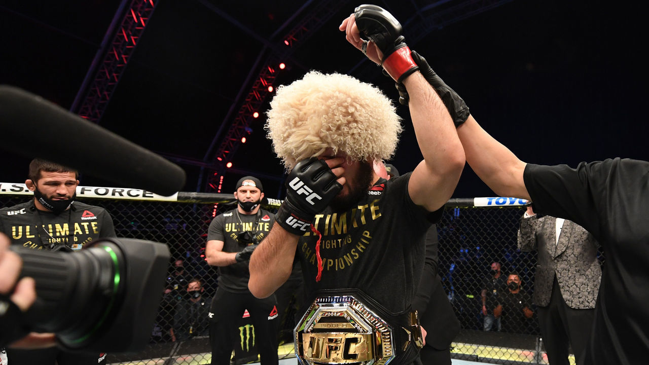 ABU DHABI, UNITED ARAB EMIRATES - OCTOBER 25: Khabib Nurmagomedov of Russia celebrates his victory over Justin Gaethje in their lightweight title bout during the UFC 254 event on October 25, 2020 on UFC Fight Island, Abu Dhabi, United Arab Emirates.