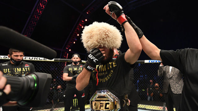 ABU DHABI, UNITED ARAB EMIRATES - OCTOBER 25: Khabib Nurmagomedov of Russia celebrates his victory over Justin Gaethje in their lightweight title bout during the UFC 254 event on October 25, 2020 on UFC Fight Island, Abu Dhabi, United Arab Emirates.
