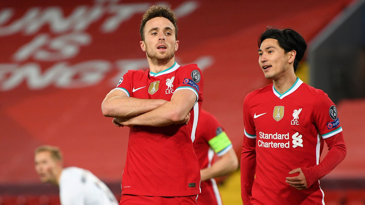 LIVERPOOL, ENGLAND - OCTOBER 27: Diogo Jota of Liverpool celebrates after scoring his team's first goal during the UEFA Champions League Group D stage match between Liverpool FC and FC Midtjylland at Anfield on October 27, 2020 in Liverpool, England. Sporting stadiums around the UK remain under strict restrictions due to the Coronavirus Pandemic as Government social distancing laws prohibit fans inside venues resulting in games being played behind closed doors.