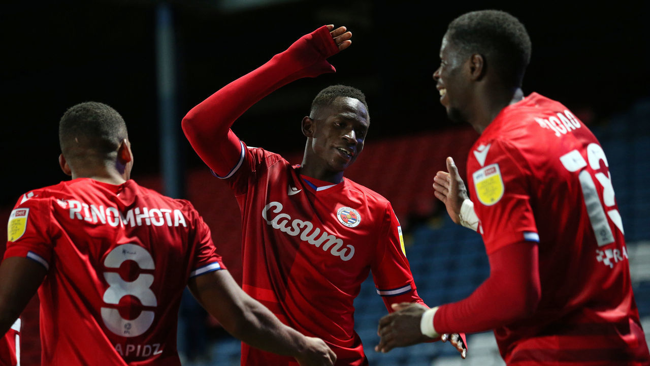 BLACKBURN, ENGLAND - OCTOBER 27: Alfa Semedo of Reading congratulates Lucas Joao after he scored their fourth goal during the Sky Bet Championship match between Blackburn Rovers and Reading at Ewood Park on October 27, 2020 in Blackburn, England. Sporting stadiums around the UK remain under strict restrictions due to the Coronavirus Pandemic as Government social distancing laws prohibit fans inside venues resulting in games being played behind closed doors.