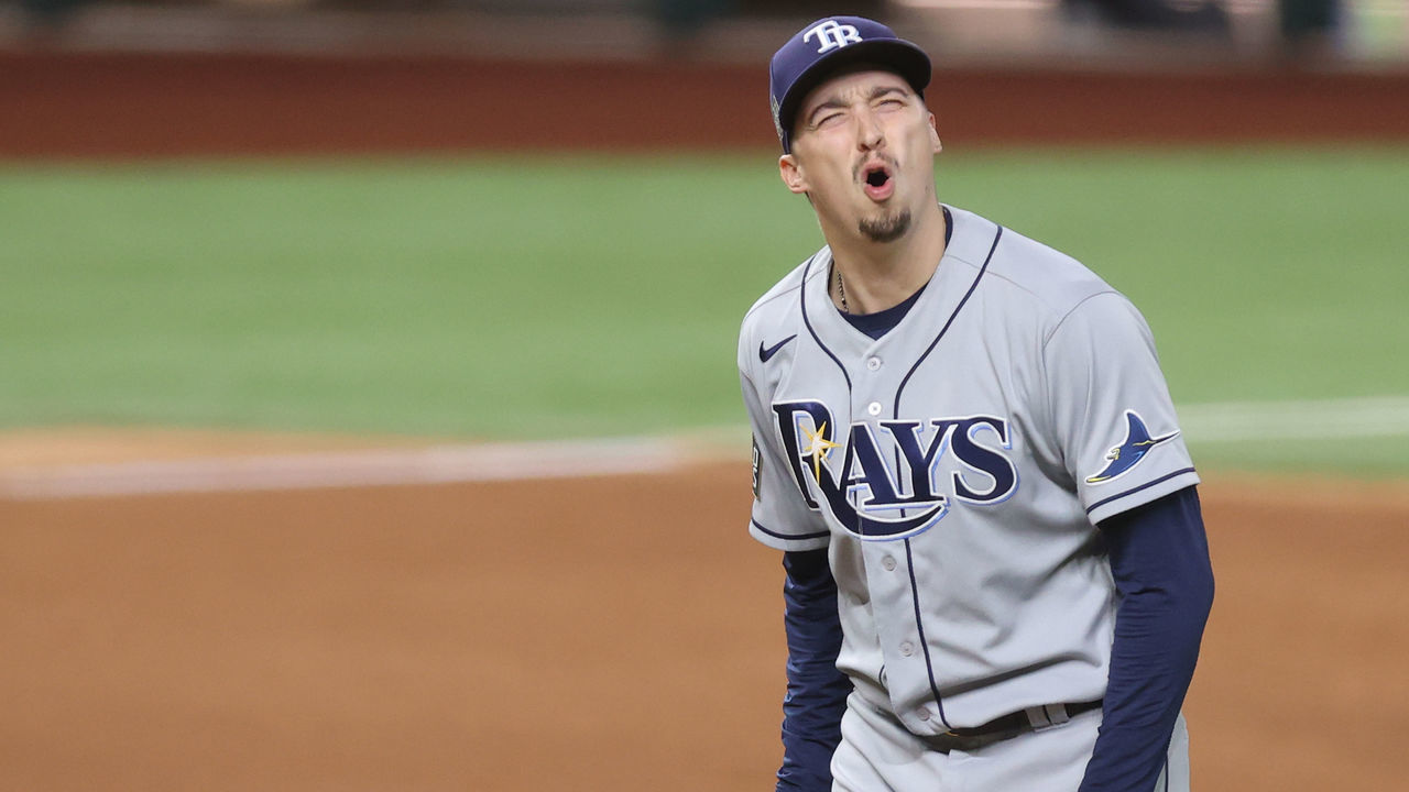 ARLINGTON, TEXAS - OCTOBER 27: Blake Snell #4 of the Tampa Bay Rays reacts as he is being taken out of the game against the Los Angeles Dodgers during the sixth inning in Game Six of the 2020 MLB World Series at Globe Life Field on October 27, 2020 in Arlington, Texas.