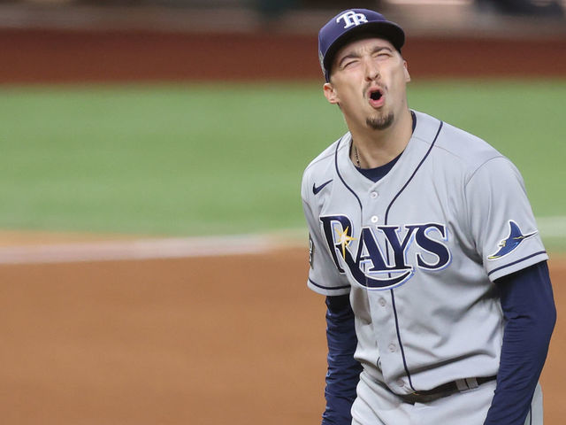 ARLINGTON, TEXAS - OCTOBER 27: Blake Snell #4 of the Tampa Bay Rays reacts as he is being taken out of the game against the Los Angeles Dodgers during the sixth inning in Game Six of the 2020 MLB World Series at Globe Life Field on October 27, 2020 in Arlington, Texas.