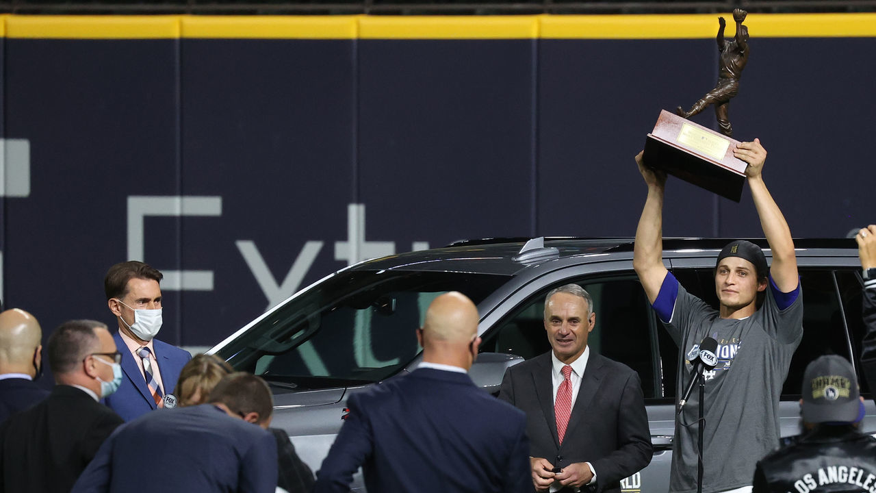 ARLINGTON, TEXAS - OCTOBER 27: Corey Seager #5 of the Los Angeles Dodgers is presented the Willie Mays World Series Most Valuable Player Award after defeating the Tampa Bay Rays 3-1 in Game Six to win the 2020 MLB World Series at Globe Life Field on October 27, 2020 in Arlington, Texas.