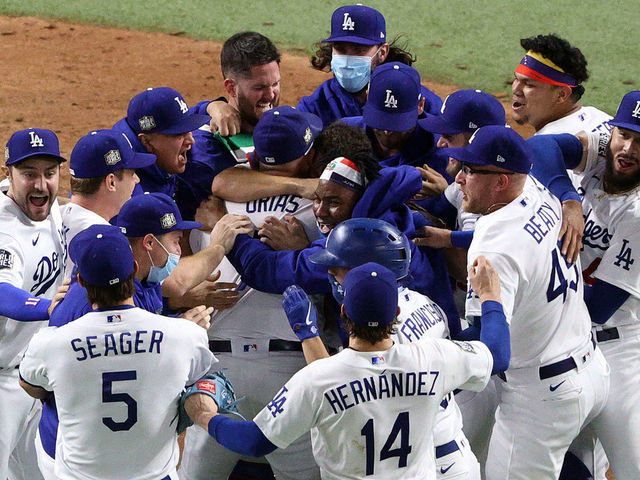 ARLINGTON, TEXAS - OCTOBER 27: The Los Angeles Dodgers celebrate after defeating the Tampa Bay Rays 3-1 in Game Six to win the 2020 MLB World Series at Globe Life Field on October 27, 2020 in Arlington, Texas.