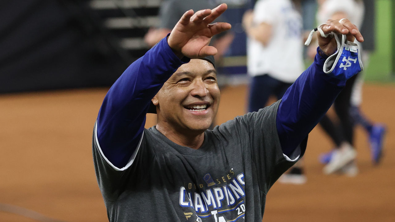 ARLINGTON, TEXAS - OCTOBER 27: Manager Dave Roberts of the Los Angeles Dodgers celebrates after defeating the Tampa Bay Rays 3-1 in Game Six to win the 2020 MLB World Series at Globe Life Field on October 27, 2020 in Arlington, Texas.