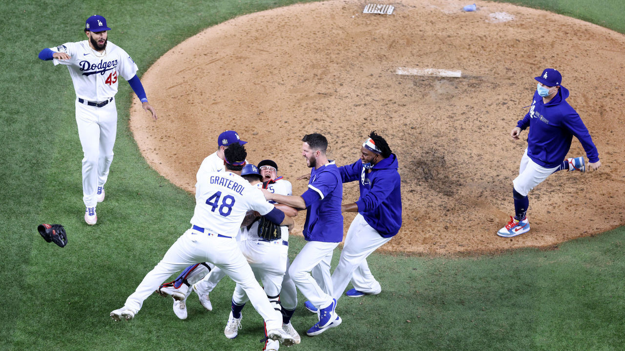 ARLINGTON, TEXAS - OCTOBER 27: The Los Angeles Dodgers celebrate after defeating the Tampa Bay Rays 3-1 in Game Six to win the 2020 MLB World Series at Globe Life Field on October 27, 2020 in Arlington, Texas.