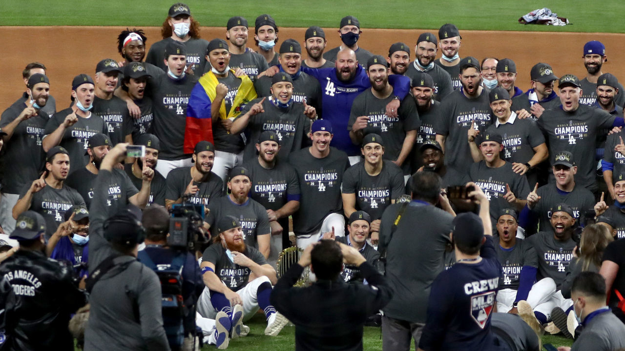 ARLINGTON, TEXAS - OCTOBER 27: The Los Angeles Dodgers pose for a photo after defeating the Tampa Bay Rays 3-1 in Game Six to win the 2020 MLB World Series at Globe Life Field on October 27, 2020 in Arlington, Texas.
