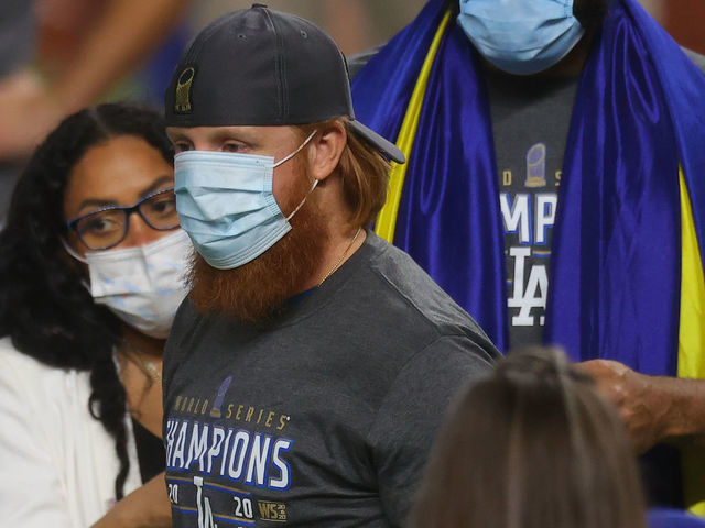 ARLINGTON, TEXAS - OCTOBER 27: Justin Turner #10 of the Los Angeles Dodgers celebrates after defeating the Tampa Bay Rays 3-1 in Game Six to win the 2020 MLB World Series at Globe Life Field on October 27, 2020 in Arlington, Texas.