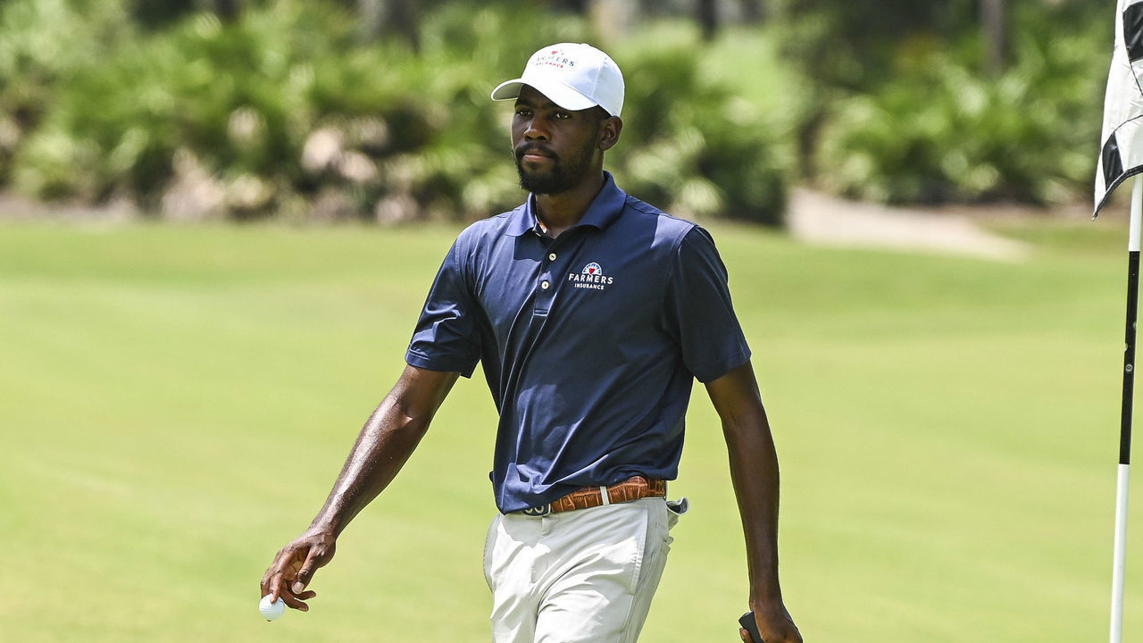 ST. AUGUSTINE, FL - JULY 09: Kamaiu Johnson walks off a green during the first round of an APGA Tour event on the Slammer & Squire Course at World Golf Village on July 9, 2020 in Saint Augustine, Florida.