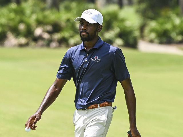 ST. AUGUSTINE, FL - JULY 09: Kamaiu Johnson walks off a green during the first round of an APGA Tour event on the Slammer & Squire Course at World Golf Village on July 9, 2020 in Saint Augustine, Florida.