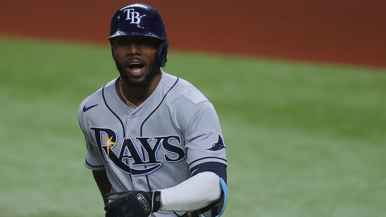 ARLINGTON, TEXAS - OCTOBER 27: Randy Arozarena #56 of the Tampa Bay Rays celebrates after hitting a solo home run against the Los Angeles Dodgers during the first inning in Game Six of the 2020 MLB World Series at Globe Life Field on October 27, 2020 in Arlington, Texas.