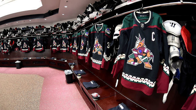GLENDALE, AZ - OCTOBER 06: Kachina jerseys hang in the Arizona Coyotes lockers prior to a game against the Anaheim Ducks at Gila River Arena on October 6, 2018 in Glendale, Arizona. The Kachina jerserys will be the third jersey for the Coyotes this season.