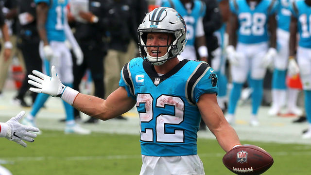 TAMPA, FL - SEP 20: Christian McCaffrey (22) of the Panthers celebrates a touchdown during the regular season game between the Carolina Panthers and the Tampa Bay Buccaneers on September 20, 2020 at Raymond James Stadium in Tampa, Florida.