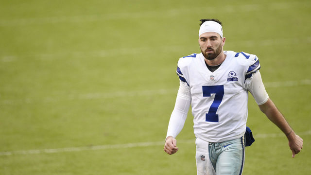 LANDOVER, MARYLAND - OCTOBER 25: Quarterback Ben DiNucci #7 of the Dallas Cowboys walks off the field after their 25-3 loss against the Washington Football Team at FedExField on October 25, 2020 in Landover, Maryland.