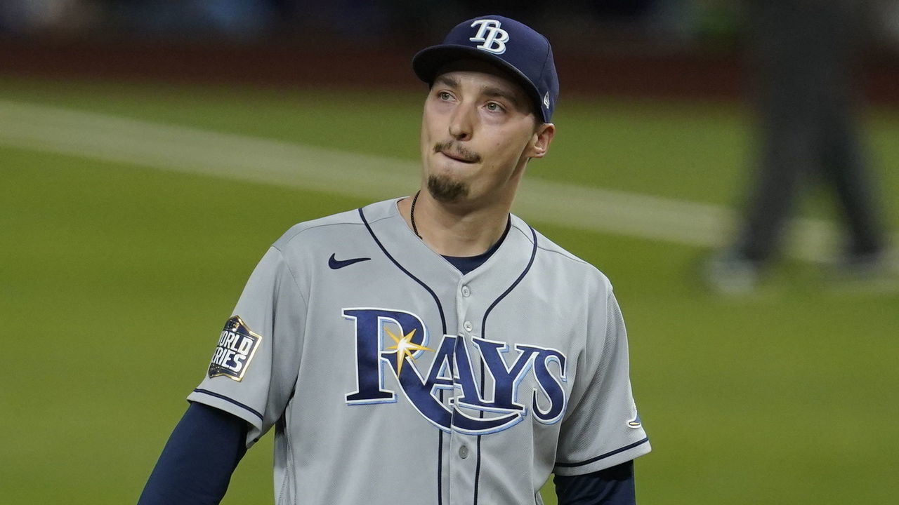 ARLINGTON, TX - OCTOBER 27: Blake Snell #4 of the Tampa Bay Rays reacts after giving up a hit in the sixth inning of Game 6 of the 2020 World Series between the Los Angeles Dodgers and the Tampa Bay Rays at Globe Life Field on Tuesday, October 27, 2020 in Arlington, Texas.