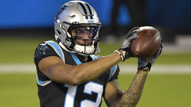 CHARLOTTE, NORTH CAROLINA - OCTOBER 29: D.J. Moore #12 of the Carolina Panthers warms up against the Atlanta Falcons at Bank of America Stadium on October 29, 2020 in Charlotte, North Carolina.
