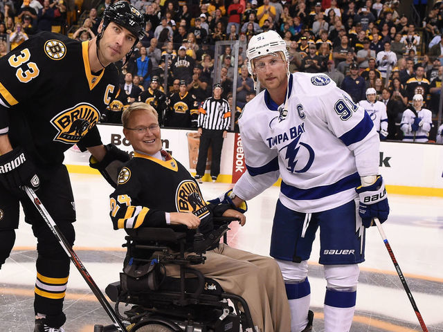 BOSTON, MA - OCTOBER 12 : Travis Roy drops the puck at center ice before the game with Zdeno Chara #33 of the Boston Bruins and Steven Stamkos #91 the Tampa Bay Lightning at the TD Garden on October 12, 2015 in Boston, Massachusetts.