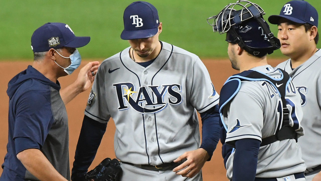 ARLINGTON, TEXAS - OCTOBER 27:Rays pitcher Blake Snell, second from left, comes out of the game against the Dodgers in the 6th inning in Game 6 of the World Series at Globe Life Field on October 27, 2020 in Arlington, Texas.