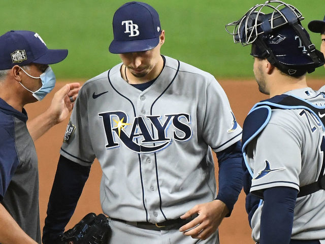 ARLINGTON, TEXAS - OCTOBER 27:Rays pitcher Blake Snell, second from left, comes out of the game against the Dodgers in the 6th inning in Game 6 of the World Series at Globe Life Field on October 27, 2020 in Arlington, Texas.