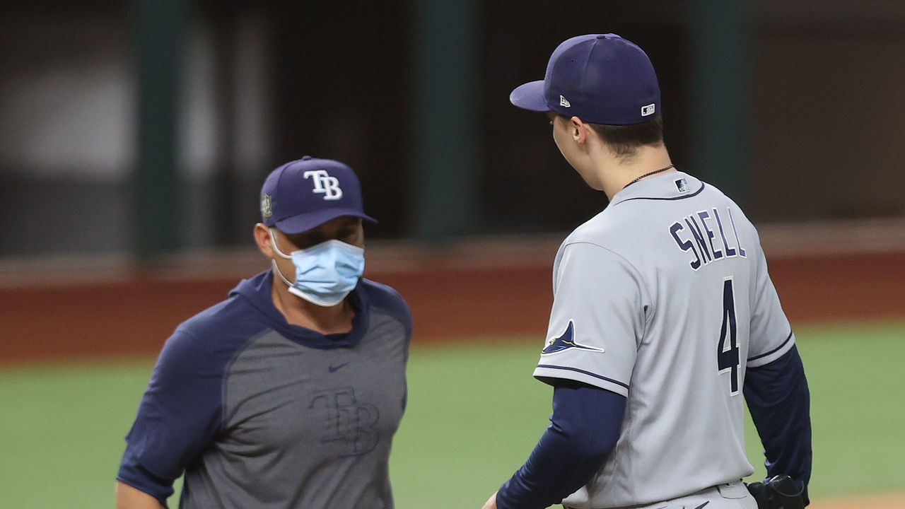 ARLINGTON, TEXAS - OCTOBER 27: Blake Snell #4 of the Tampa Bay Rays is taken out of the game by manager Kevin Cash during the sixth inning against the Los Angeles Dodgers in Game Six of the 2020 MLB World Series at Globe Life Field on October 27, 2020 in Arlington, Texas.