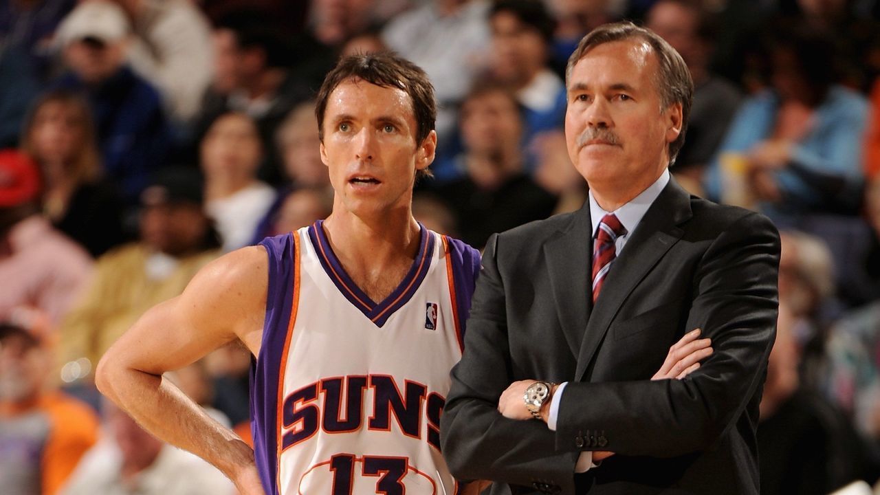 PHOENIX - FEBRUARY 6: Steve Nash #13 and head coach Mike D'Antoni of the Phoenix Suns looks across the court during the game against the New Orleans Hornets on February 6, 2008 at US Airways Center in Phoenix, Arizona. The Hornets won in double overtime 132-130. NOTE TO USER: User expressly acknowledges and agrees that, by downloading and/or using this Photograph, user is consenting to the terms and conditions of the Getty Images License Agreement. Mandatory Copyright Notice: Copyright 2008 NBAE