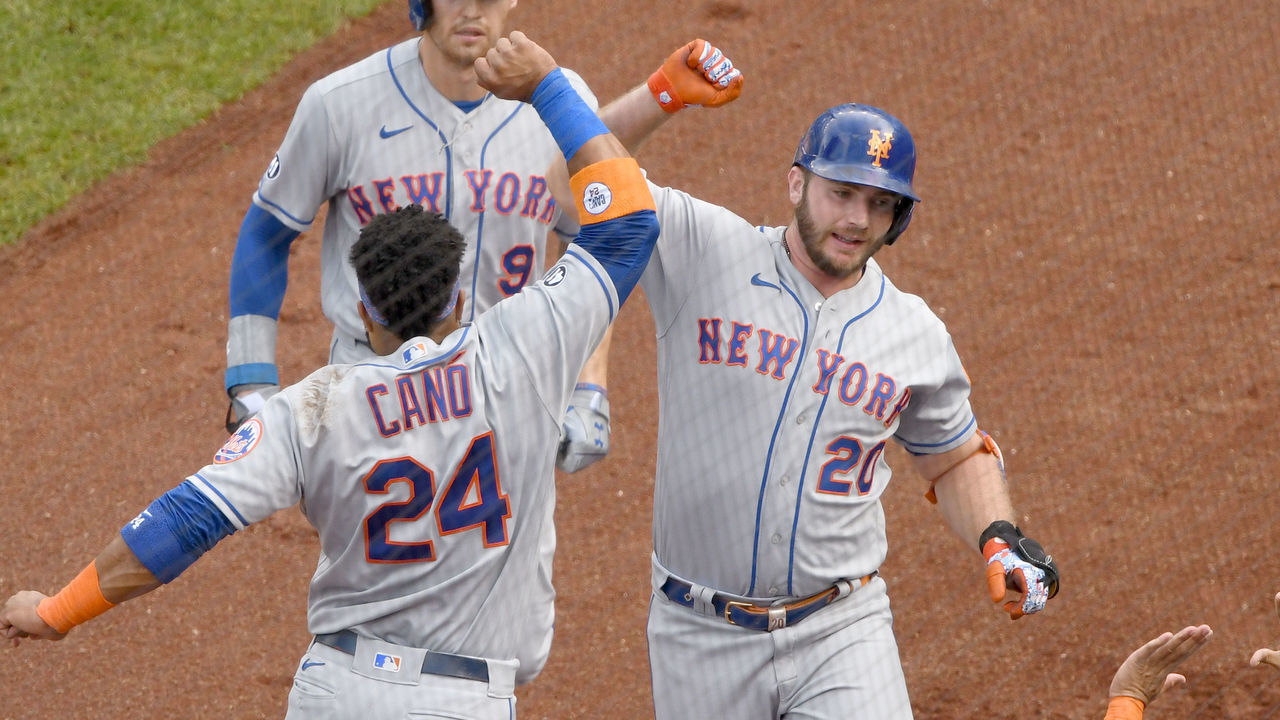 WASHINGTON, DC - SEPTEMBER 27: Pete Alonso #20 of the New York Mets celebrates a two run home run in the first inning with Robinson Cano #24 during a baseball game against the Washington Nationals at Nationals Park on September 27, 2020 in Washington, DC.