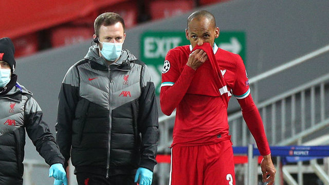 Liverpool's Fabinho (right) is substituted after suffering an injury during the UEFA Champions League Group D match at Anfield, Liverpool.