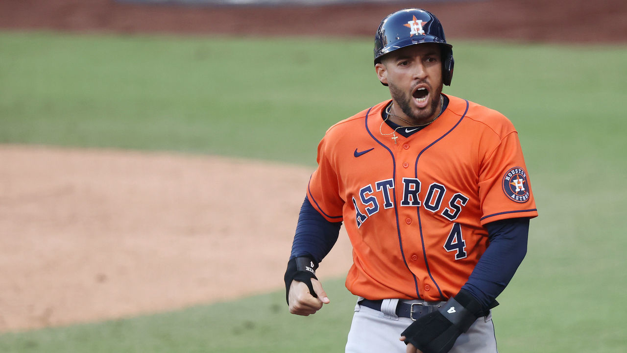SAN DIEGO, CALIFORNIA - OCTOBER 16: George Springer #4 of the Houston Astros celebrates scoring on a Jose Altuve #27 RBI double during the fifth inning against the Tampa Bay Rays in Game Six of the American League Championship Series at PETCO Park on October 16, 2020 in San Diego, California.