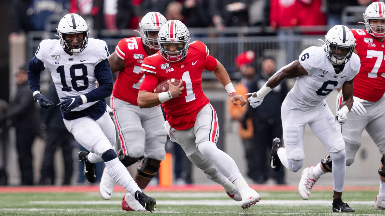 COLUMBUS, OH - NOVEMBER 23: Justin Fields #1 of the Ohio State Buckeyes runs with the ball during game action between the Ohio State Buckeyes and the Penn State Nittany Lions on November 23, 2019, at Ohio Stadium in Columbus, OH.