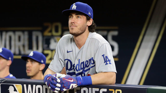 ARLINGTON, TX - OCTOBER 24: Cody Bellinger #35 of the Los Angeles Dodgers looks on in the dugout during Game 4 of the 2020 World Series between the Los Angeles Dodgers and the Tampa Bay Rays at Globe Life Field on Saturday, October 24, 2020 in Arlington, Texas.