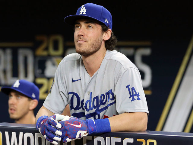 ARLINGTON, TX - OCTOBER 24: Cody Bellinger #35 of the Los Angeles Dodgers looks on in the dugout during Game 4 of the 2020 World Series between the Los Angeles Dodgers and the Tampa Bay Rays at Globe Life Field on Saturday, October 24, 2020 in Arlington, Texas.