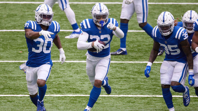 INDIANAPOLIS, IN - OCTOBER 18: Indianapolis Colts Safety Julian Blackmon (32) celebrates with Indianapolis Colts Safety George Odum (30) and points down field after intercepting the football in game action during a NFL game between the Indianapolis Colts and the Cincinnati Bengals on October 18, 2020, at Lucas Oil Stadium in Indianapolis, IN.