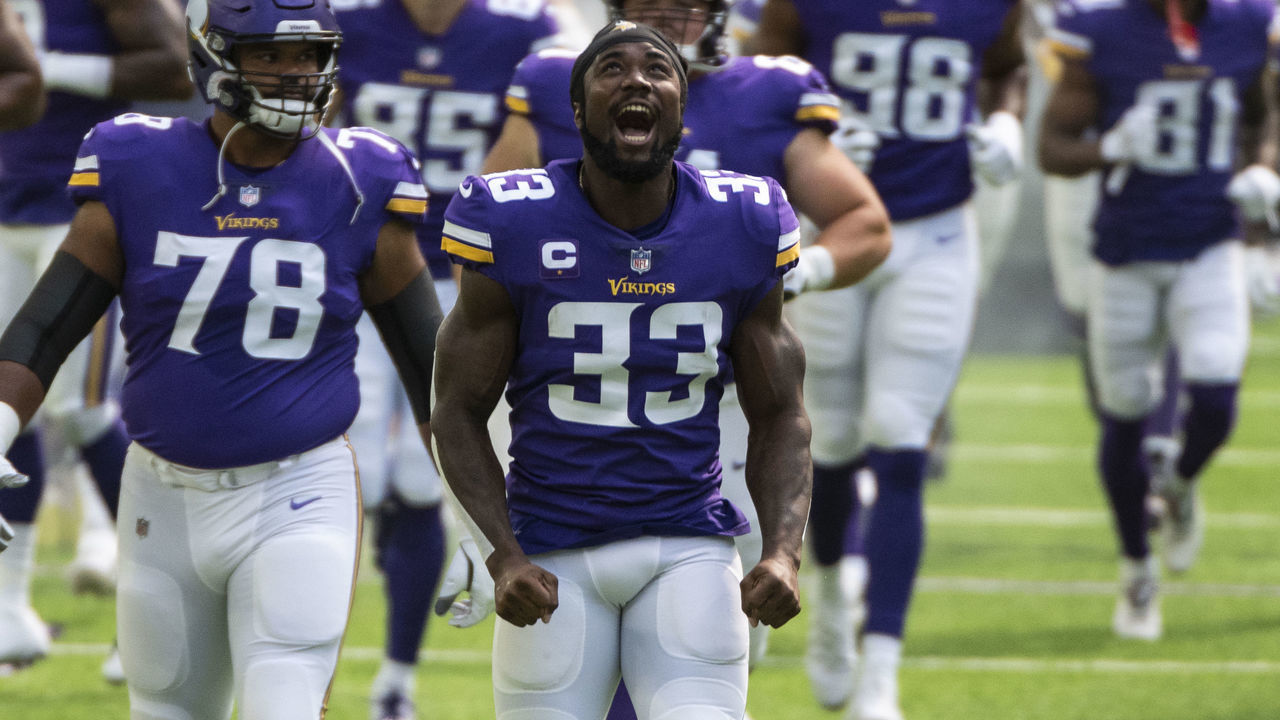 MINNEAPOLIS, MN - SEPTEMBER 27: Dalvin Cook #33 of the Minnesota Vikings and his teammates take the field before the game against the Tennessee Titans at U.S. Bank Stadium on September 27, 2020 in Minneapolis, Minnesota.