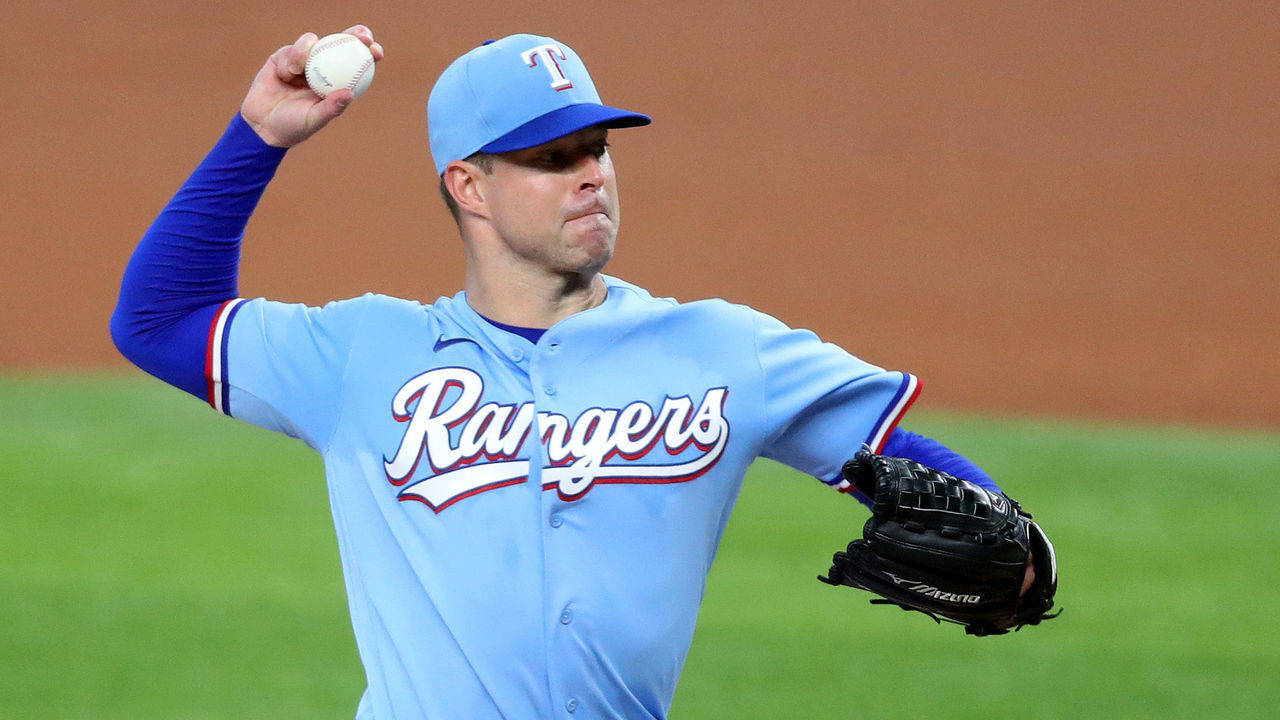 ARLINGTON, TEXAS - JULY 26: Corey Kluber (28) of the Texas Rangers pitches against the Colorado Rockies in the top of the first inning at Globe Life Field on July 26, 2020 in Arlington, Texas.