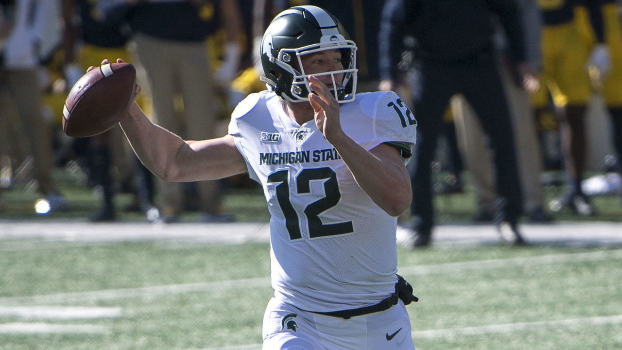 ANN ARBOR, MI - OCTOBER 31: Rocky Lombardi #12 of the Michigan State Spartans throws a pass during the second quarter against the Michigan Wolverines at Michigan Stadium on October 31, 2020 in Ann Arbor, Michigan.