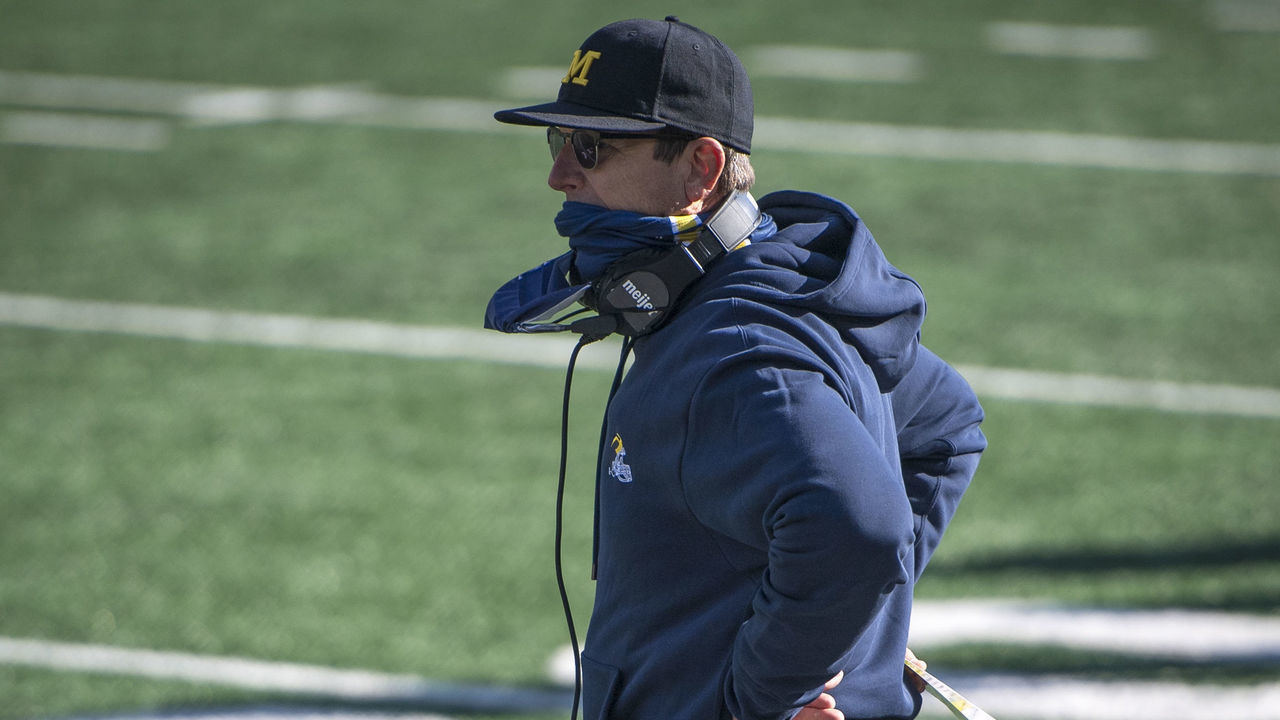 ANN ARBOR, MI - OCTOBER 31: Head coach Jim Harbaugh of the Michigan Wolverines looks on during the fourth quarter against the Michigan State Spartans at Michigan Stadium on October 31, 2020 in Ann Arbor, Michigan.