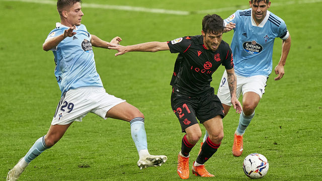 VIGO, SPAIN - NOVEMBER 01: Jose Fontan (L) and Manuel Agudo 'Nolito' of Celta de Vigo compete for the ball with David Silva of Real Sociedad during the La Liga Santander match between RC Celta and Real Sociedad at Abanca Balaidos Stadium on November 01, 2020 in Vigo, Spain. Football Stadiums around Europe remain empty due to the Coronavirus Pandemic as Government social distancing laws prohibit fans inside venues resulting in fixtures being played behind closed doors.