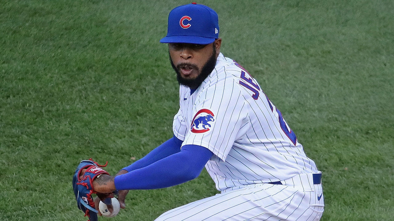 CHICAGO, ILLINOIS - OCTOBER 02: Jeremy Jeffress #24 of the Chicago Cubs pitches against the Miami Marlins during Game Two of the National League Wild Card Series at Wrigley Field on October 02, 2020 in Chicago, Illinois. The Marlins defeated the Cubs 2-0.