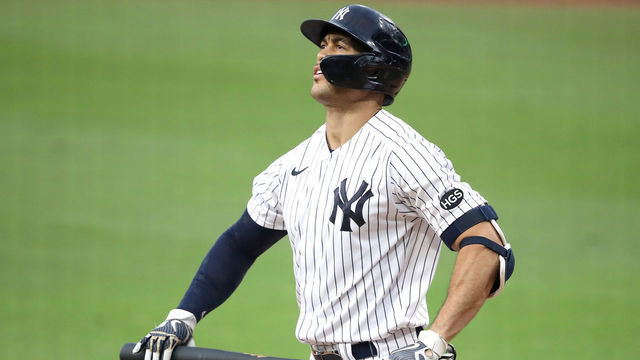 SAN DIEGO, CALIFORNIA - OCTOBER 08: Giancarlo Stanton #27 of the New York Yankees reacts after striking out against the Tampa Bay Rays during the fifth inning in Game Four of the American League Division Series at PETCO Park on October 08, 2020 in San Diego, California.
