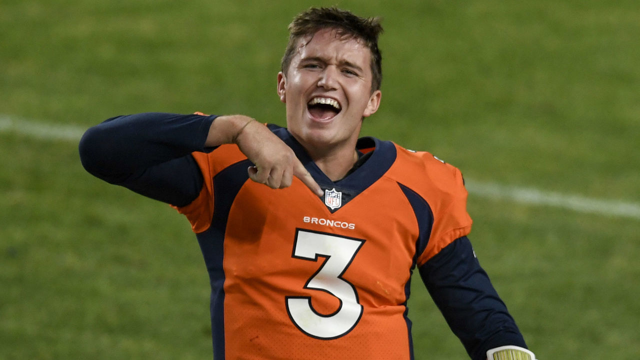DENVER, CO - NOVEMBER 1: Drew Lock (3) of the Denver Broncos celebrates throwing a game-winning touchdown pass to K.J. Hamler (13) over Tevaughn Campbell (37) of the Los Angeles Chargers during the second half of Denver's 31-30 win on Sunday, November 1, 2020.