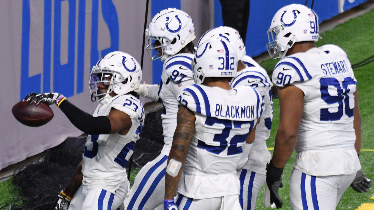 DETROIT, MICHIGAN - NOVEMBER 01: Kenny Moore II #23 of the Indianapolis Colts celebrates with teammates after returning a interception for a touchdown against the Detroit Lions during the fourth quarter at Ford Field on November 01, 2020 in Detroit, Michigan.