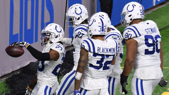 DETROIT, MICHIGAN - NOVEMBER 01: Kenny Moore II #23 of the Indianapolis Colts celebrates with teammates after returning a interception for a touchdown against the Detroit Lions during the fourth quarter at Ford Field on November 01, 2020 in Detroit, Michigan.