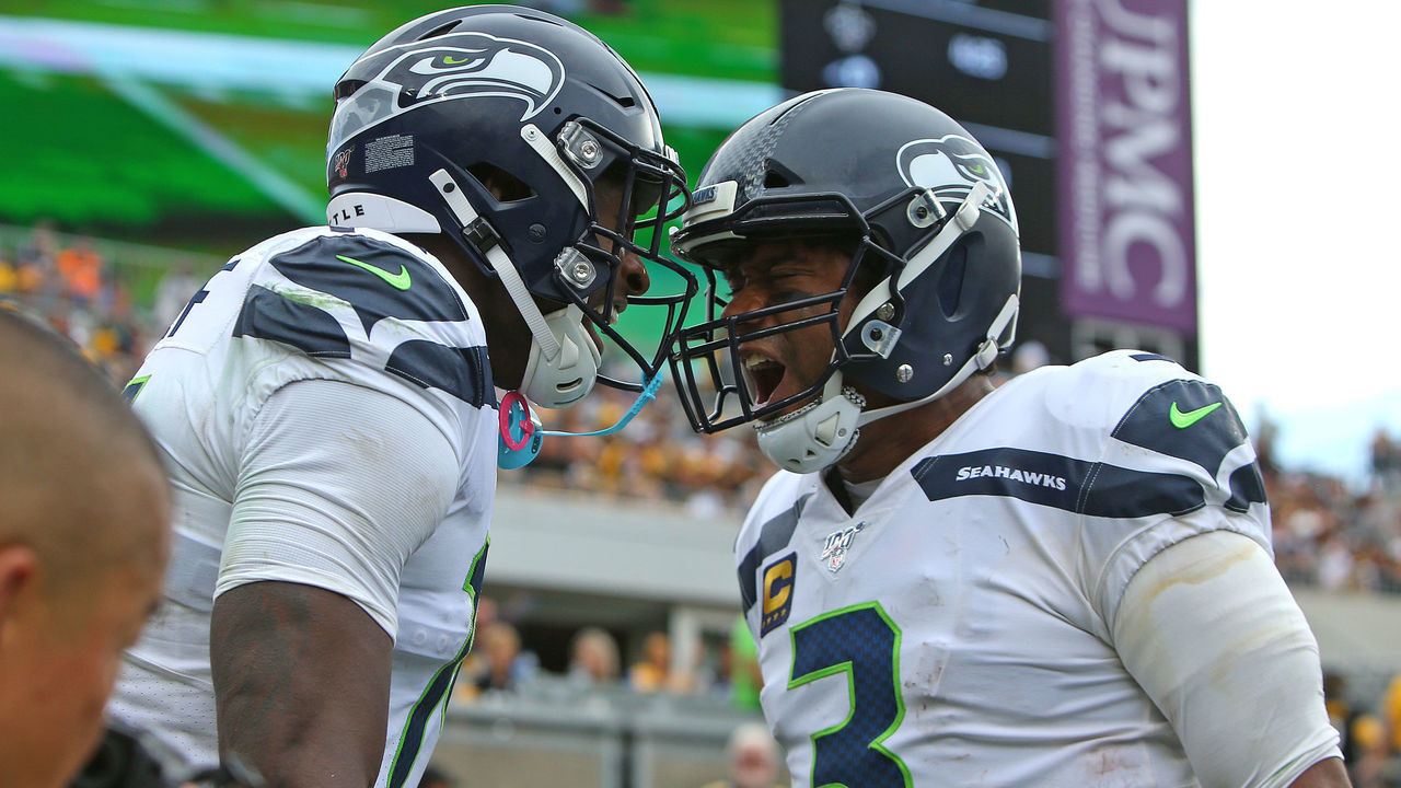 PITTSBURGH, PA - SEPTEMBER 15: D.K. Metcalf #14 of the Seattle Seahawks and Russell Wilson #3 of the Seattle Seahawks in action against the Pittsburgh Steelers on September 15, 2019 at Heinz Field in Pittsburgh, Pennsylvania.