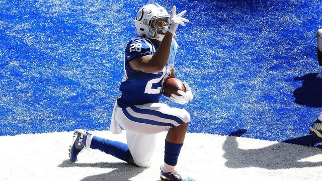 INDIANAPOLIS, INDIANA - SEPTEMBER 20: Jonathan Taylor #28 of the Indianapolis Colts celebrates after scoring a touchdown against the Minnesota Vikings at Lucas Oil Stadium on September 20, 2020 in Indianapolis, Indiana.