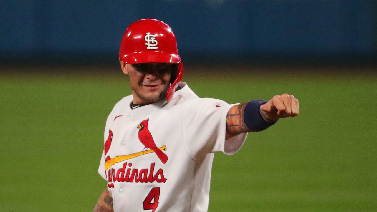 ST LOUIS, MO - SEPTEMBER 24: Yadier Molina #4 of the St. Louis Cardinals acknowledges his teammates in the dugout after recording his 2,000th career hit with a single against the Milwaukee Brewers in the seventh inning at Busch Stadium on September 24, 2020 in St Louis, Missouri.