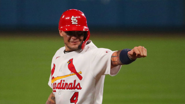 ST LOUIS, MO - SEPTEMBER 24: Yadier Molina #4 of the St. Louis Cardinals acknowledges his teammates in the dugout after recording his 2,000th career hit with a single against the Milwaukee Brewers in the seventh inning at Busch Stadium on September 24, 2020 in St Louis, Missouri.